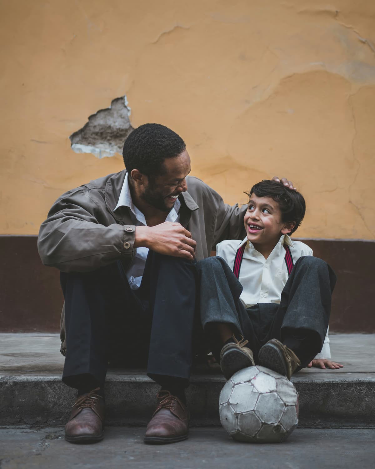 Father and son laughing together